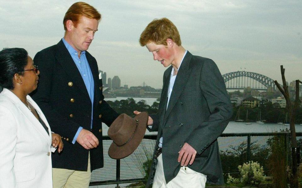 Mark Dyer with Harry and fellow aide Colleen Harris at Taronga Zoo in Sydney, marking the start of the prince's gap year - Alamy