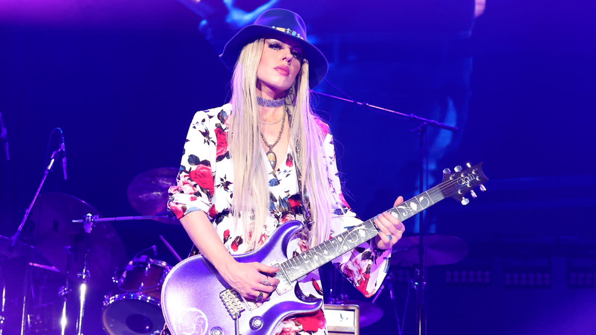  Orianthi performs in concert with Carlos Santana at Dos Equis Pavilion on May 06, 2023 in Dallas, Texas. 