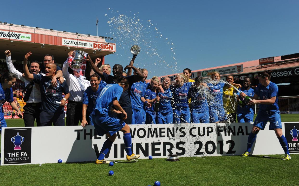 Birmingham City Ladies FC players celebrate with the Women's FA Cup after victory in the FA Women's Cup Final 2012 at Ashton Gate on May 26, 2012 in Bristol, England