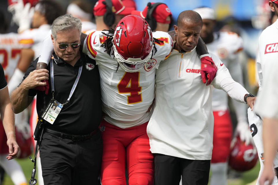 Kansas City Chiefs wide receiver Rashee Rice is assisted after being injured during the first half of an NFL football game against the Los Angeles Chargers on Sunday, Sept. 29, 2024, in Inglewood, Calif. (AP Photo/Ashley Landis)