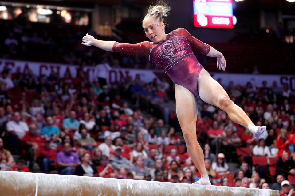 Oklahoma's Olivia Trautman falls off the beam during the University of Oklahoma's women's gymnastics NCAA Regional at Lloyd Noble Center in Norman, Okla., Saturday, April 1, 2023. 