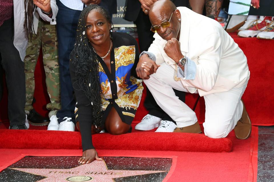 Sekyiwa ‘Set’ Shakur and Mopreme Shakur, the rapper’s step-siblings, attend the ceremony honouring Shakur at the Hollywood Walk Of Fame (Getty)