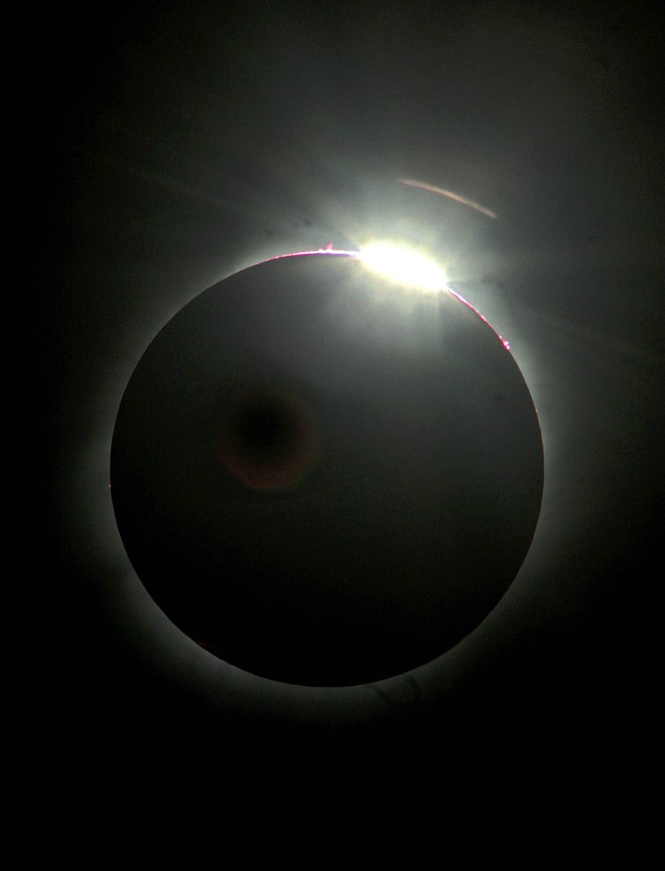 A total solar eclipse is seen on March 29, 2006 above Athens, Greece. In an annular or total eclipse, the Moon moves between the Sun and Earth and completely blocking the sun. (Photo by Milos Bicanski/ Getty Images)