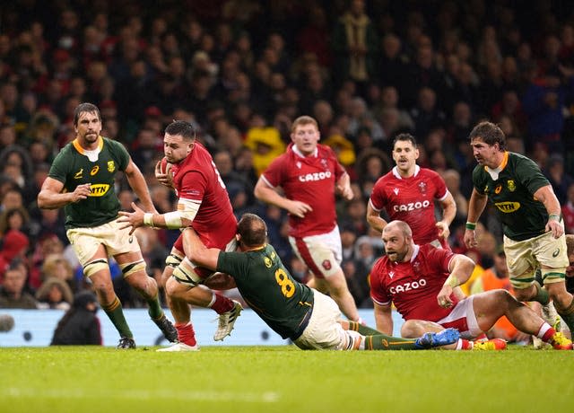 Wales’ Ellis Jenkins is tackled by South Africa’s Duane Vermeulen