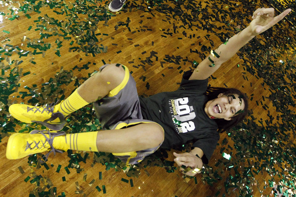 FILE - Baylor's Brittney Griner celebrates her team's 56-51 win over Texas Tech in an NCAA college basketball game, Saturday, Feb. 18, 2012, in Waco, Texas. (AP Photo/LM Otero, File)