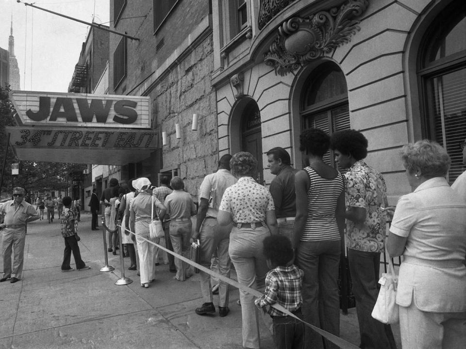 Crowds line up outside a New York City theater to see 