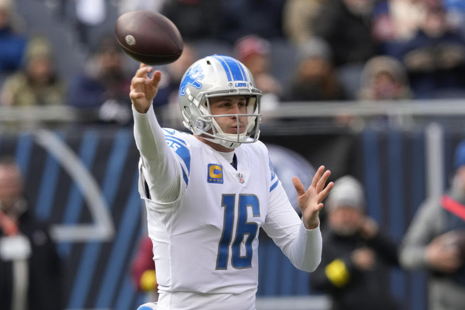 Detroit Lions quarterback Jared Goff (16) throws against the Chicago Bears during the first half of an NFL football game in Chicago, Sunday, Nov. 13, 2022. (AP Photo/Charles Rex Arbogast)