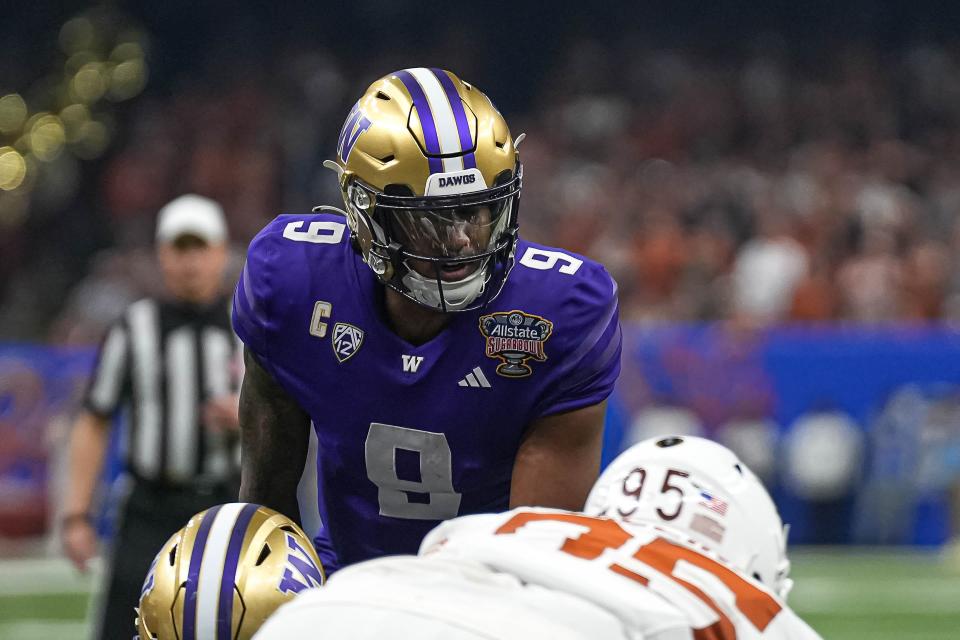 Washington quarterback Michael Penix Jr. was masterful in Monday night's 37-31 takedown of Texas in the Sugar Bowl. Penix threw for 430 yards and two touchdowns without an interception in the Huskies' win.