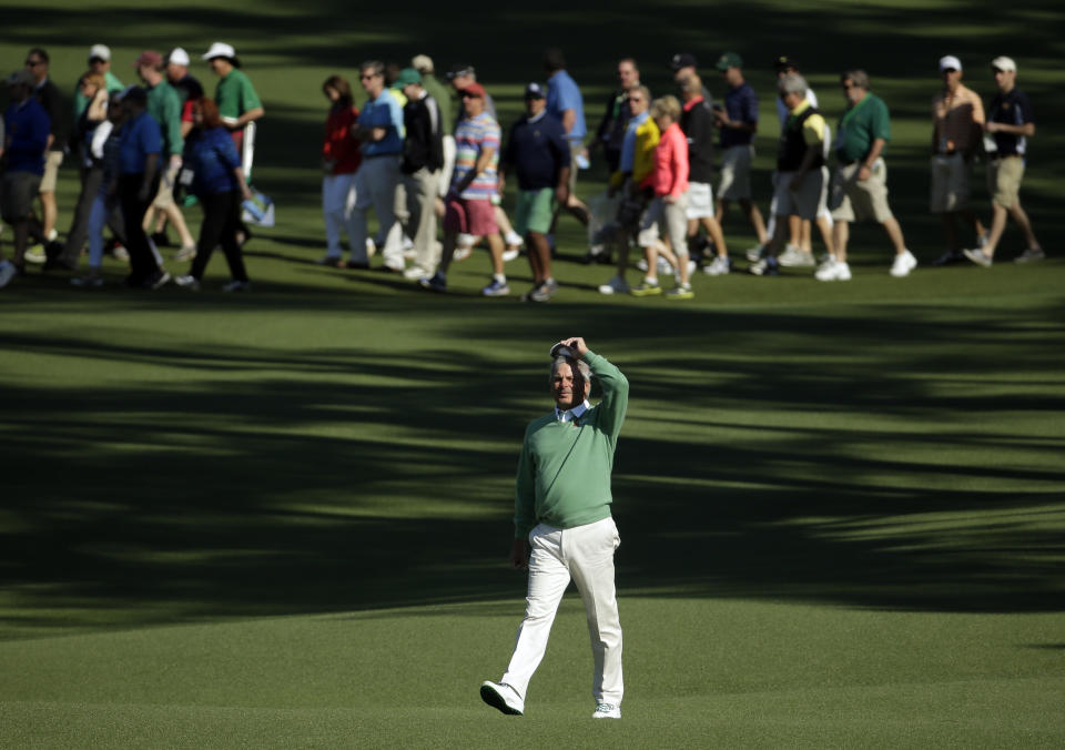 Fred Couples walks down the second fairway during the first round of the Masters golf tournament Thursday, April 10, 2014, in Augusta, Ga. (AP Photo/Chris Carlson)