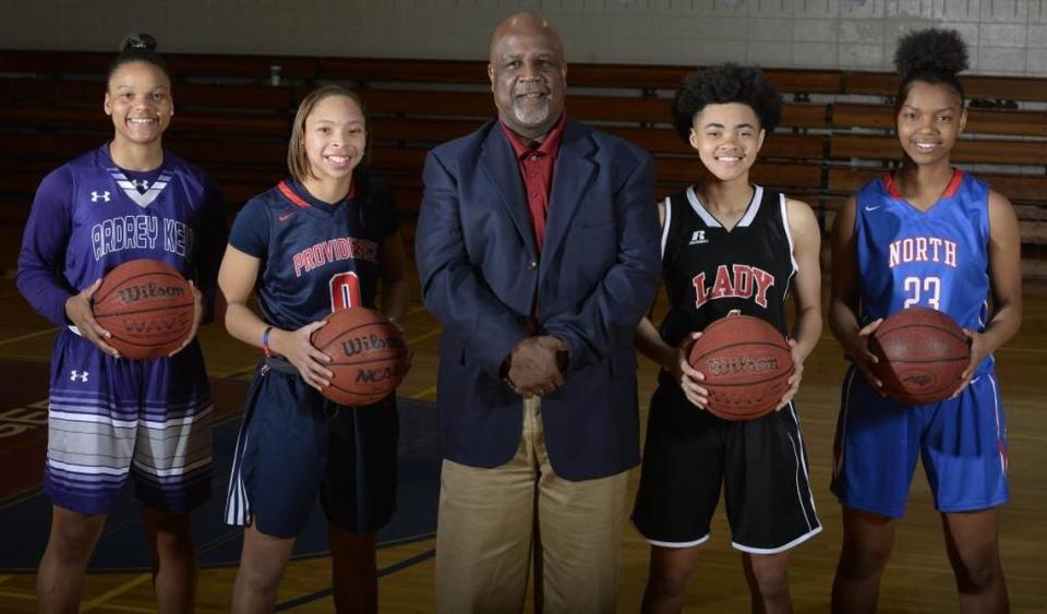 Former Mallard Creek coach Clarence Johnson was The Observer’s Mecklenburg County coach of the year in 2018. Pictured with the All-Mecklenburg girls’ basketball team (left to right): Deniyah Lutz, Ardrey Kell; Kennedy Boyd, Providence Day; Coach Clarence Johnson, Mallard Creek; Jordan McLaughlin, Berry; and Jessica Timmons, North Mecklenburg. Not pictured is Mallard Creek’s Ahlana Smith David T. Foster III/dtfoster@charlotteobserver.com