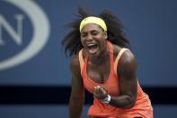 Serena Williams of the U.S. celebrates a point against Kiki Bertens of the Netherlands during their second round match at the U.S. Open Championship tennis tournament in New York, September 2, 2015. REUTERS/Carlo Allegri