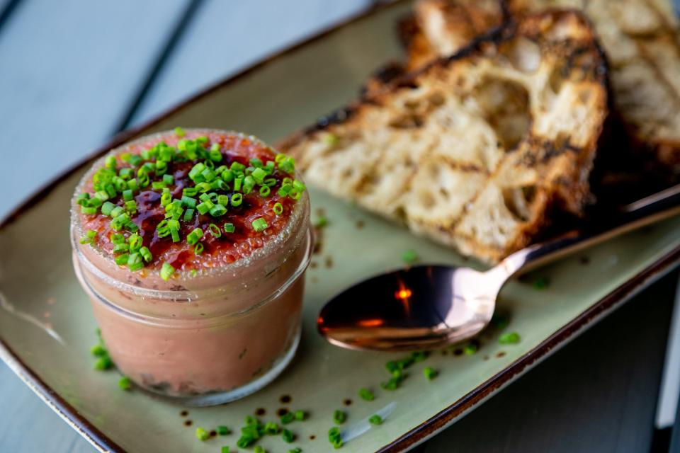 Indian-spiced chicken liver pate is served with sourdough toast at Stage Kitchen, a global plates restaurant by acclaimed chef Pushkar Marathe. The Palm Beach Gardens spot opened Feb. 14, 2020.  