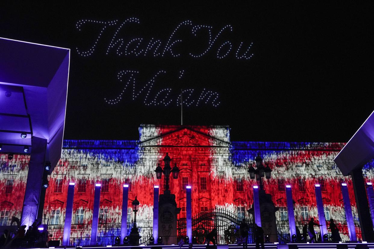 The words "Thank You Ma'am" are illuminated over Buckingham Palace during the Platinum Jubilee concert in front of Buckingham Palace in London on Saturday, June 4, 2022, on the third of four days of celebrations to mark the Platinum Jubilee.