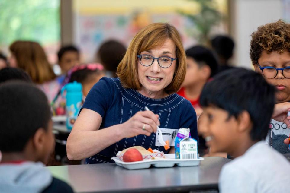 Cindy Long, administrator of the USDA Food and Nutrition Service, has lunch with students from Kingswood Elementary in Cary on Tuesday, June 4, 2024.  Wake County school officials informed the school board Tuesday of a plan to potentially add 28 more schools to the federal government.  the government's universal school meals program.