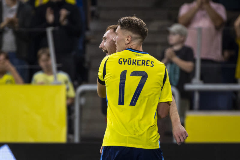 SOLNA, SWEDEN - SEPTEMBER 8: Viktor Gyokeres of Sweden celebrates with teammate Dejan Kulusevski after scoring 3-0 during the UEFA Nations League 2024/25 League C Group C1 match between Sweden and Estonia at Strawberry Arena on September 8, 2024 in Solna, Sweden. (Photo by Michael Campanella/Getty Images)