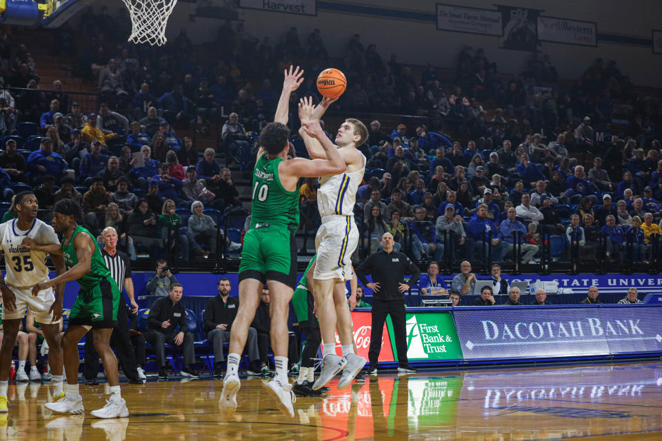 South Dakota State basketball's Matt Dentlinger goes up for a shot during Thursday's Summit League win over North Dakota.