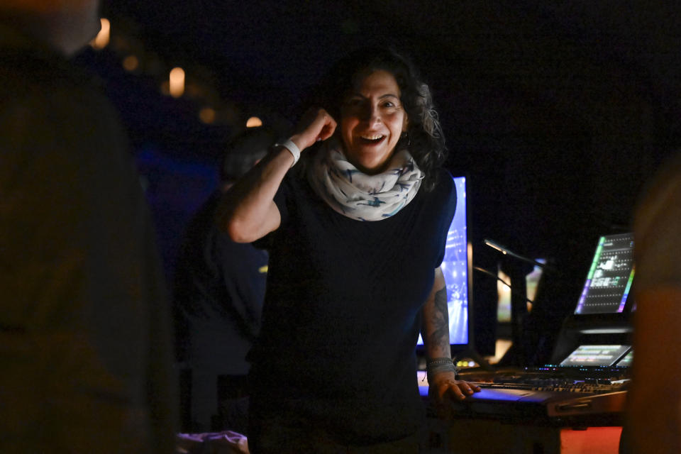 Abigail Rosen Holmes, show director and co-creative director for the band Phish's upcoming show at the Sphere, works in the control booth during rehearsals on Tuesday, April 16, 2024, in Las Vegas. (AP Photo/David Becker)