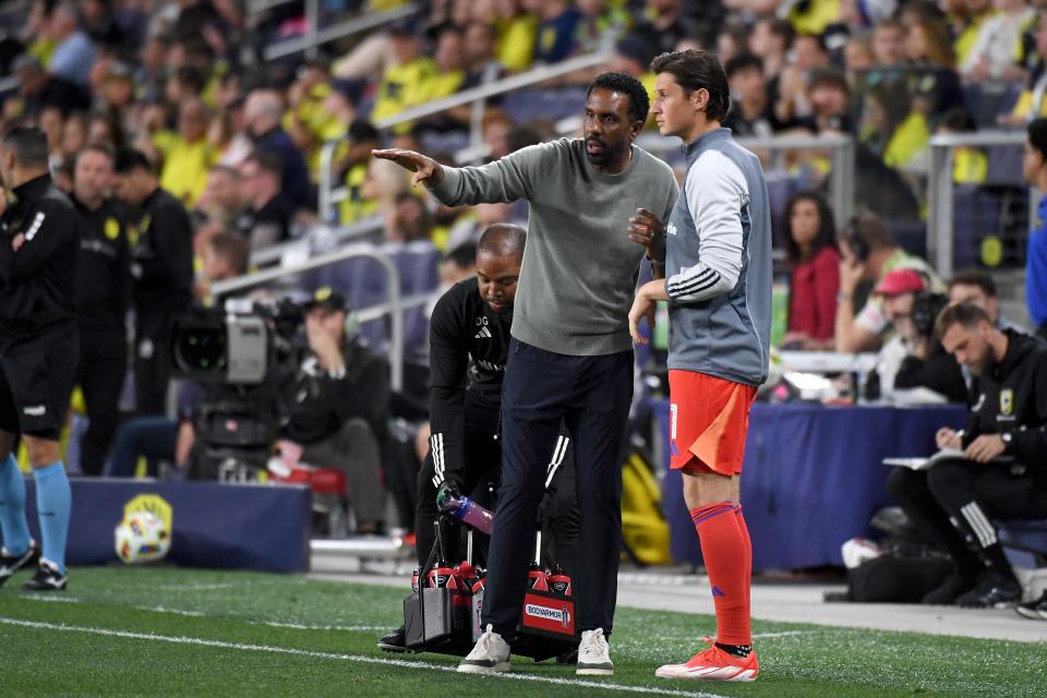 Mar 30, 2024; Nashville, Tennessee, USA;Columbus Crew head coach Wilfried Nancy talks to goalkeeper Nicholas Hagen (1) in the second half against Nashville SC at Geodis Park. Mandatory Credit: Christopher Hanewinckel-USA TODAY Sports