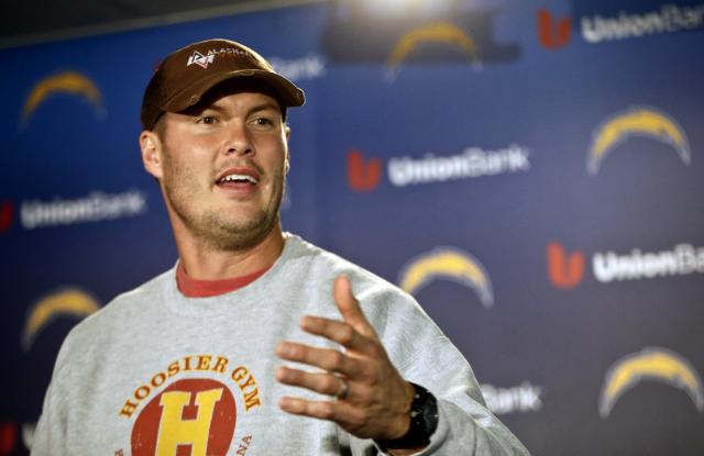 San Diego Chargers quarterback Philip Rivers talks about the Chargers' upset playoff victory over the Cincinnati Bengals and their upcoming NFL football game against the Denver Broncos at a news conference Monday, Jan. 6, 2014, in San Diego. (AP Photo/Lenny Ignelzi)