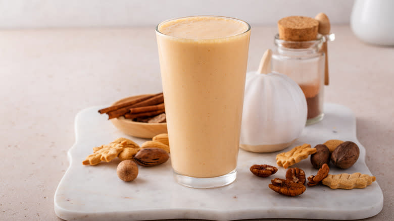 Creamy smoothie with nuts and cinnamon