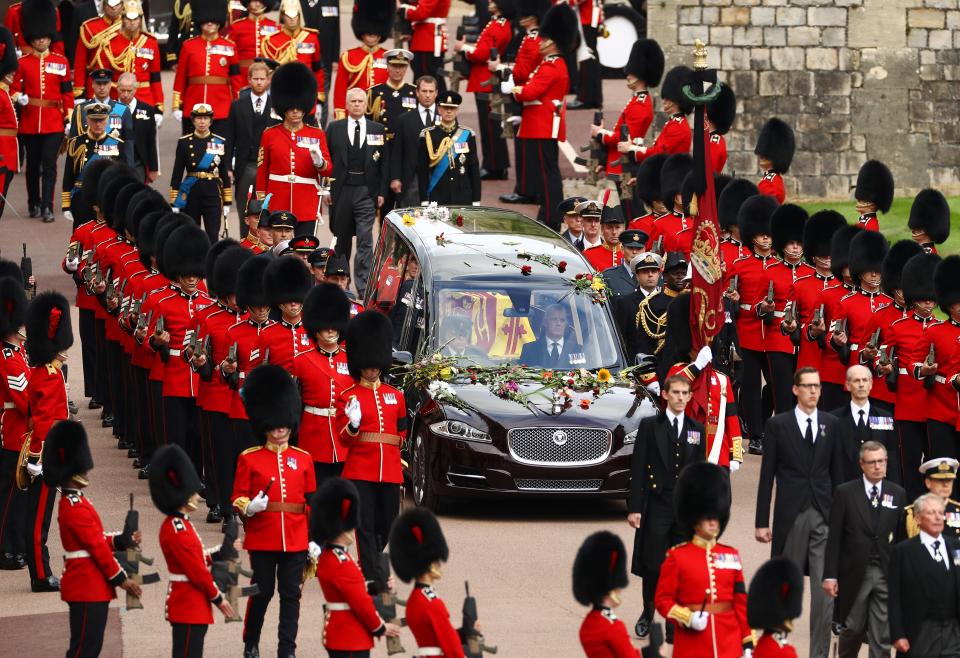 The Royal State Hearse carrying the coffin of Queen Elizabeth II arrives at Windsor Castle for the Committal Service for Queen Elizabeth II on Sept 19, 2022 in Windsor, England.