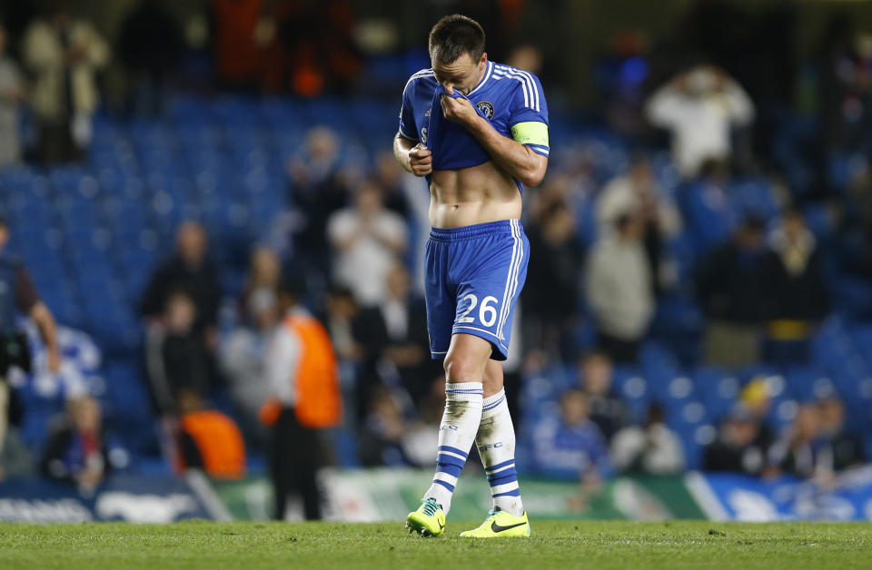 Chelsea's John Terry reacts at the end of a Champions League semifinal second leg soccer match between Chelsea and Atletico Madrid at Stamford Bridge Stadium in London Wednesday, April 30, 2014. (AP Photo/Kirsty Wigglesworth)