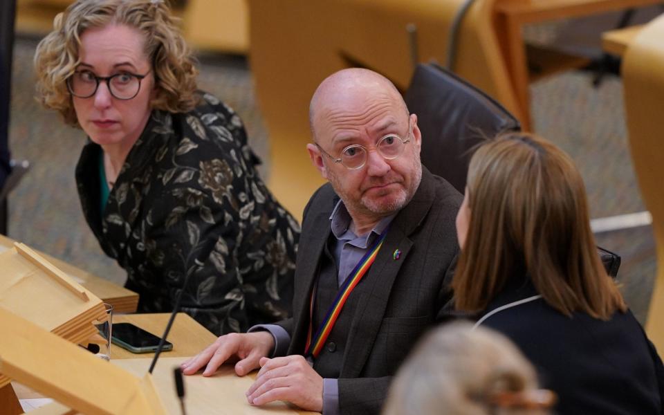 Green party leaders Patrick Harvie and Lorna Slater look on as Mairi McAllan, the net zero minister announces new proposal