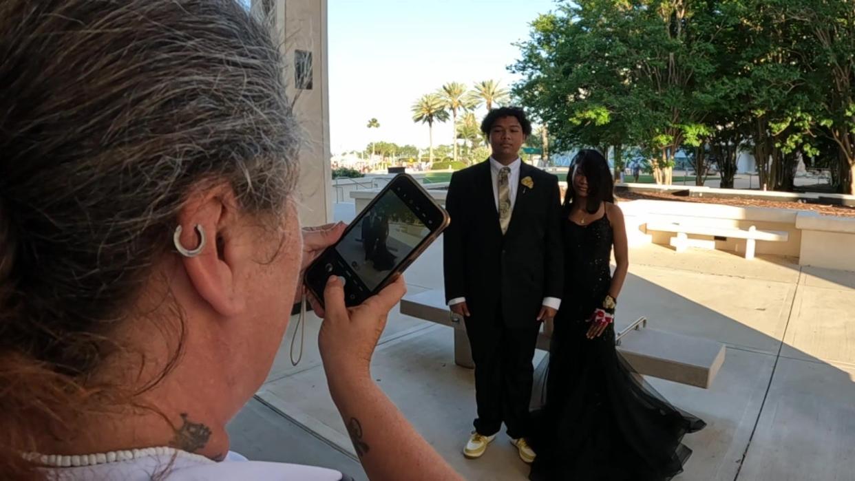 <div>Hollie Eddins snaps photos of her son as he attends the prom with his date.</div>