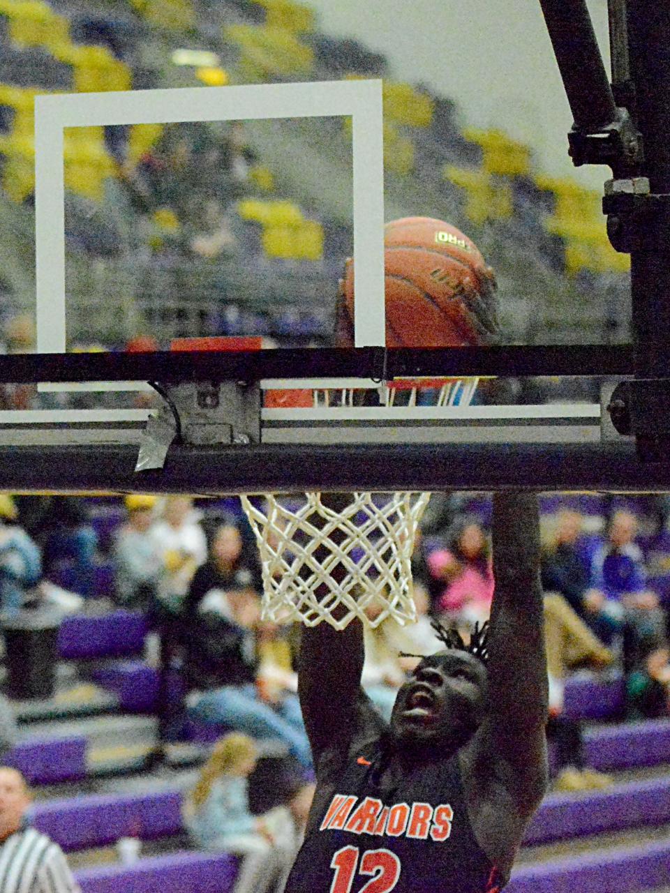 Sioux Falls Washington's AJ Akot dunks the ball during a high school boys basketball game on Friday, Feb. 3, 2023 in the Watertown Civic Arena.