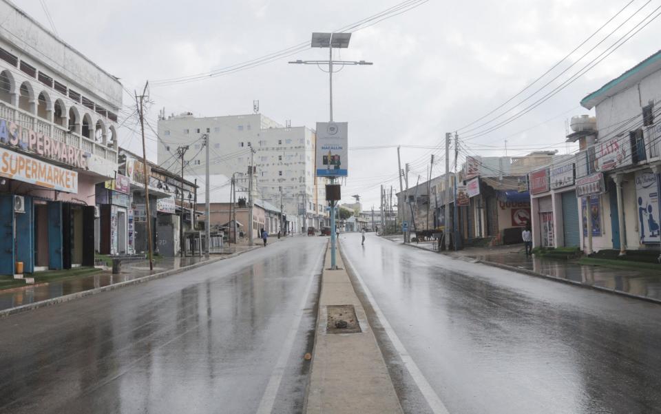 A deserted stretch along the Maka al-Mukarama street following the attack on the Villa Rose Hotel in Mogadishu - Feisal Omar/Reuters