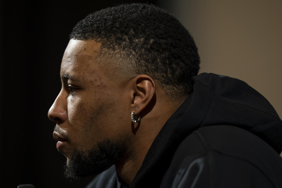 Philadelphia Eagle's Saquon Barkley talks to the media during a press conference after signing with the NFL football team, Thursday, March 14, 2024, in Philadelphia. (AP Photo/Chris Szagola)