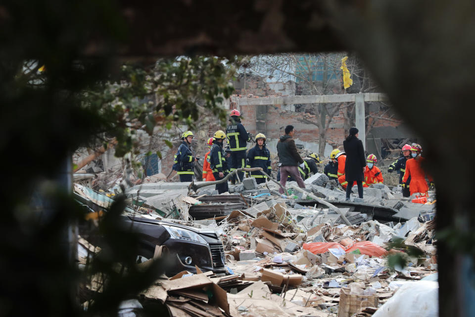 <p>Rescue workers are seen at the site of an explosion in Ningbo, China’s eastern Zhejiang province on Nov. 26, 2017. (Photo: STR/AFP/Getty Images) </p>