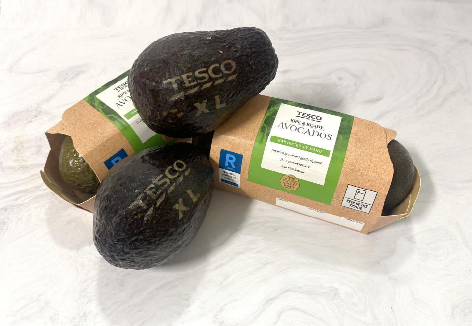 As part of an environmentally friendly trial, Tesco will use laser engraving instead of stickers on its extra-large avocados. (Tesco/ PA)