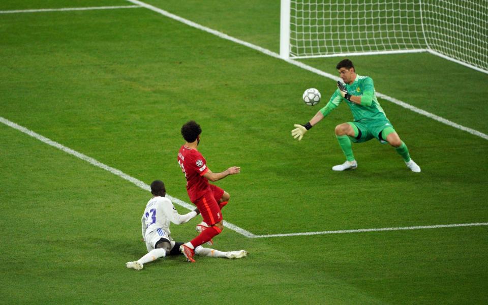 Real Madrid Goalkeeper Thibaut Courtois saves from Liverpool's Mohamed Salah during the UEFA Champions League Final at the Stade de France - Peter Byrne/PA Wire