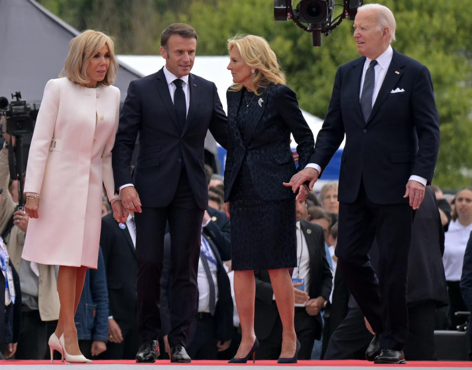 SAINT-LAURENT-SUR-MER,  FRANCE - JUNE 6: (L/R): French President's wife Brigitte Macron, France's President Emmanuel Macron, US First Lady Jill Biden and US President Joe Biden arrive at the International commemorative ceremony at Omaha Beach marking the 80th anniversary of the World War II "D-Day" Allied landings on June 6, 2024 in Normandy,  Saint-Laurent-sur-Mer, France. The D-Day ceremonies on June 6 this year mark the 80th anniversary since the launch of 'Operation Overlord', a vast military operation by Allied forces in Normandy, which turned the tide of World War II, eventually leading to the liberation of occupied France and the end of the war against Nazi Germany. (Photo by Lou Benoist - Pool/Getty Images)