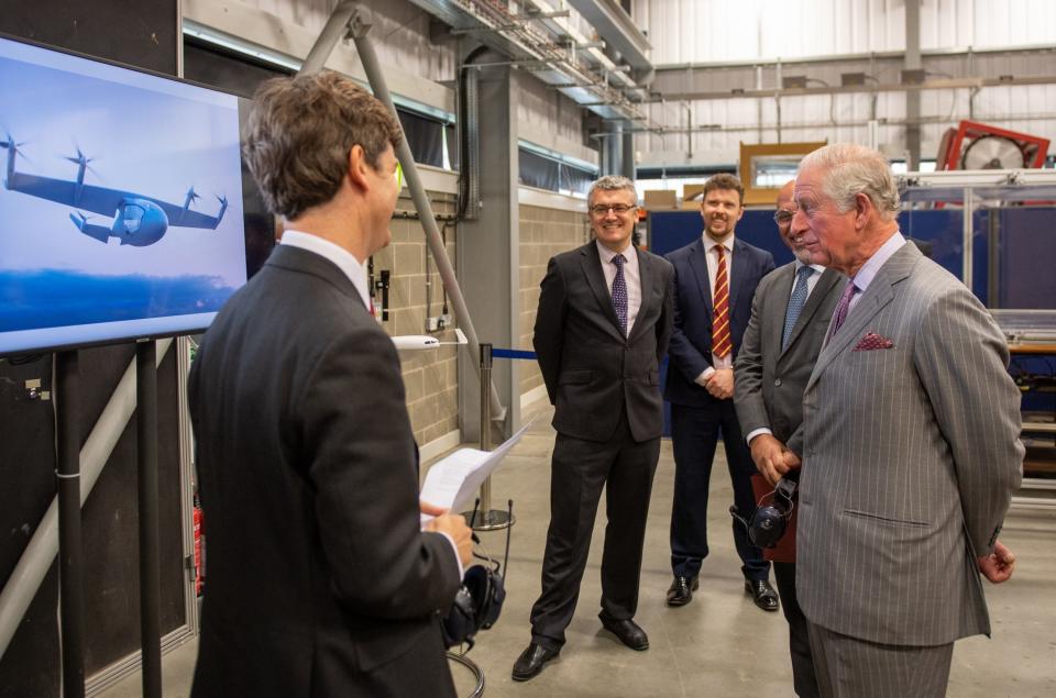 The Prince of Wales watches a demonstration on electric powered planes during his tour of the Whittle Laboratory (PA)