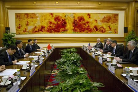 Chinese Vice Premier Wang Yang (2nd L) and U.S. Treasury Secretary Jack Lew (2nd R) face each other at the start of a meeting at the Zhongnanhai Leadership Compound in Beijing March 30, 2015. REUTERS/Mark Schiefelbein/Pool