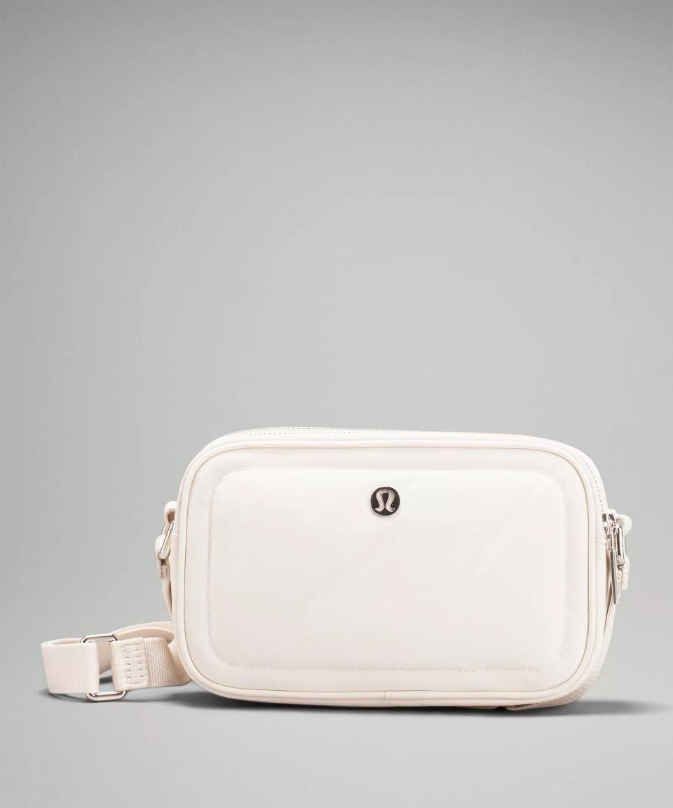 <p><a href="https://go.redirectingat.com?id=74968X1596630&url=https%3A%2F%2Fshop.lululemon.com%2Fp%2Faccessories%2FCrossbody-Camera-Bag%2F_%2Fprod10870477&sref=https%3A%2F%2F" rel="nofollow noopener" target="_blank" data-ylk="slk:Shop Now;elm:context_link;itc:0;sec:content-canvas" class="link ">Shop Now</a></p><p>Crossbody Camera Bag</p><p>lululemon.com</p><p>$78.00</p>