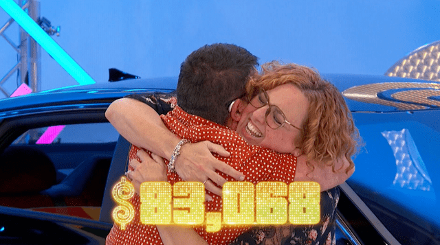 <p>CBS</p> Patrice Masse and his wife, Tina, celebrate on 'The Price is Right'