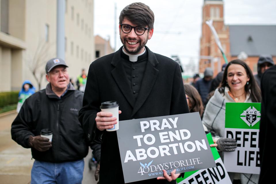 Father Alexander Kroll walks with hundreds Jan. 21 as they march from downtown Oklahoma City to the Oklahoma Capitol as part of the Oklahoma March for Life.