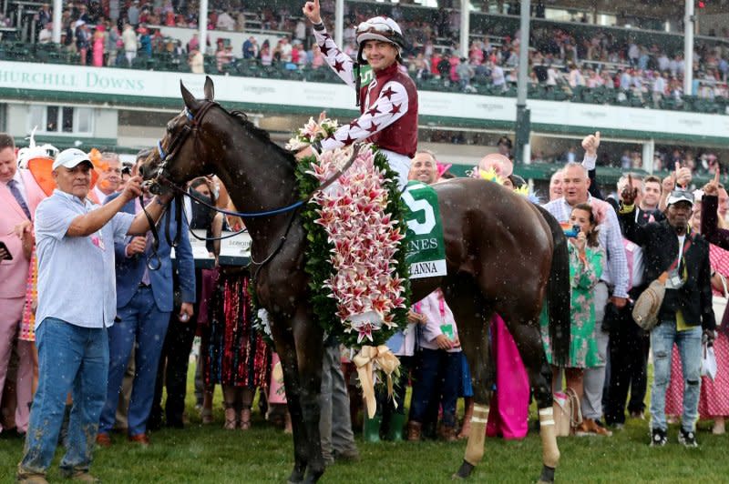 Jockey Brian Hernandez Jr. on Thorpedo Anna celebrates in the winners circle after winning the 150th running of the Kentucky Oaks at Churchill Downs on Friday in Louisville, Ky. Photo by John Sommers II/UPI