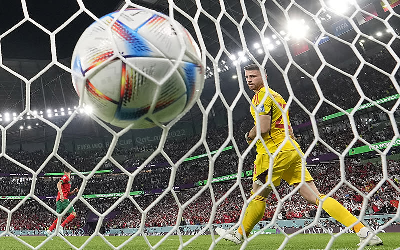 Spain’s goalkeeper Unai Simón looks around after Morocco’s Achraf Hakimi scored the winning penalty during a shootout in the World Cup round of 16 match between Morocco and Spain, at the Education City Stadium in Al Rayyan, Qatar, on Dec. 6. <em>Associated Press/Martin Meissner</em>