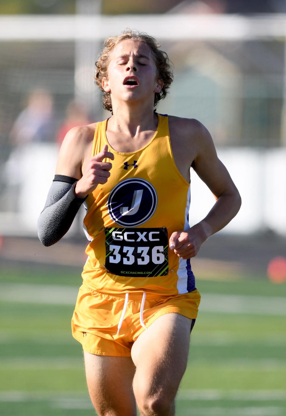 Jackson's Eli Ilg finishes first in the varsity boys race at Saturday's Stark County Cross Country Championships.