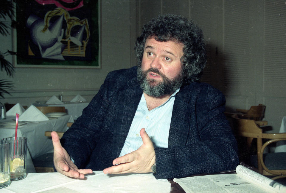 FILE - This 1990 file photo shows director of photography Allen Daviau speaking during an interview in Los Angeles. Daviau, who shot three of Steven Spielberg’s films including “E.T. The Extra-Terrestrial,” died Tuesday, April 14, 2020 at age 77. (AP Photo/Julie Markes, FIle)