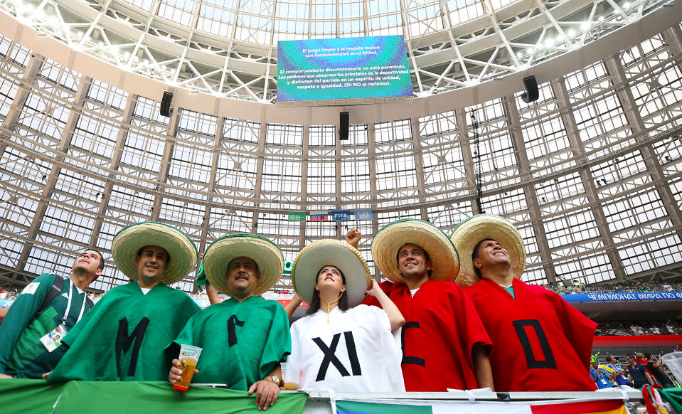 <p>Mexico fans also made a five-person show of support before their opening fixture against Germany. (Getty) </p>