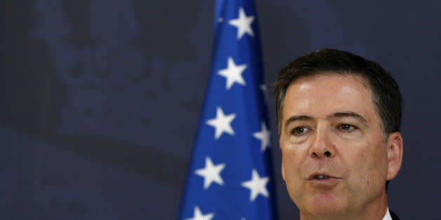 FBI Direcotr James Comey speaks during a news conference after talks with Serbian Interior Minister Nebojsa Stefanovic in Belgrade, Serbia, Tuesday, June 23, 2015. Comey arrived on a one-day visit to Belgrade where he is to hold several meetings with Serbia officials. (AP Photo/Darko Vojinovic) (Photo: )