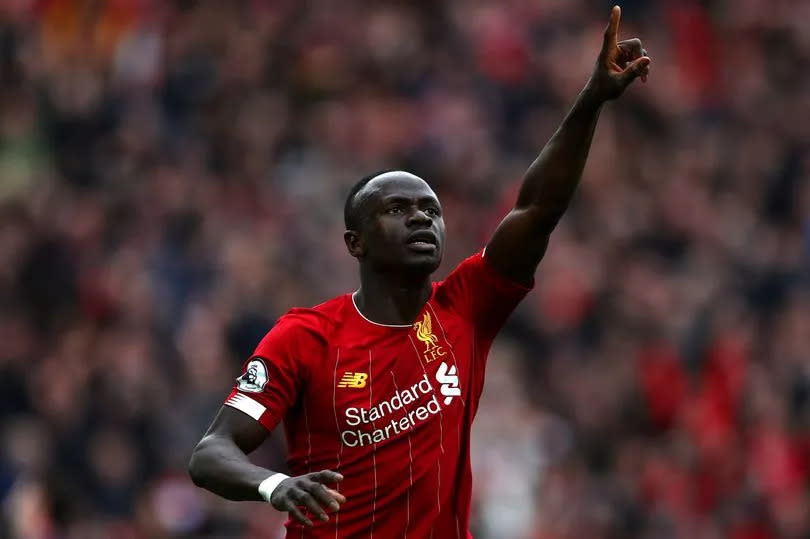 Sadio Mane celebrates after scoring a goal for Liverpool.