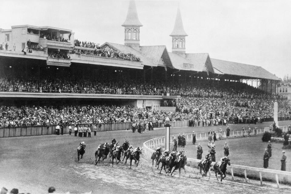 FILE - In this June 9, 1945, file photo, Hoop Jr. leads by a length during the 71st running of the Kentucky Derby horse race at Churchill Downs in Louisville, Ky. This year is the first time the Derby won't be held on the first Saturday in May since 1945, when it was run June 9. Starting in 1930, the term Triple Crown became popular in referring to the three races and since 1931, the Derby, Preakness and Belmont have been run in that order. It's possible that the Derby could be the final of the three races this year. (AP Photo/File)