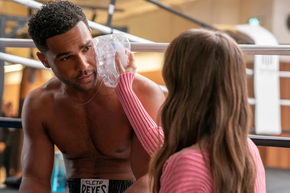 (L to R) Lucien Laviscount as Alfie, Lily Collins as Emily in episode 401 of Emily in Paris (Stephanie Branchu/Netflix)