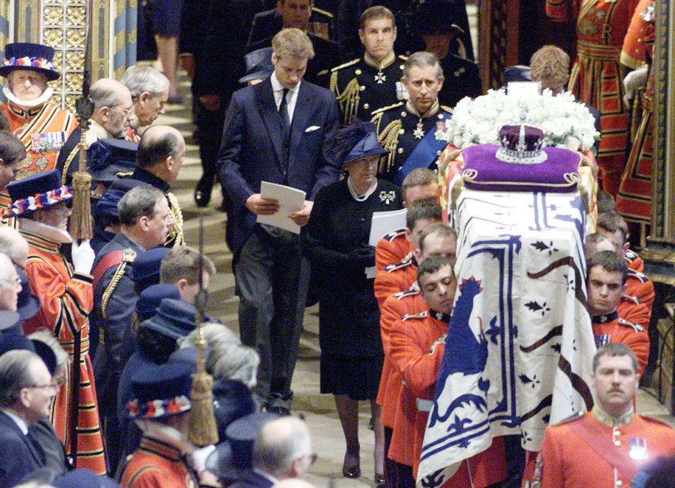 Members of the royal family at the funeral of the Queen Mother at Westminster Abbey in 2002 (PA) (PA Archive)